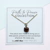 Necklace with a smoky quartz pendant on a 'Path to Peace Collection' card with text.
