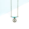 Necklace with peace symbol pendant and amazonite beads on a light blue and white background