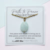 Necklace with an amazonite pendant on a 'Path to Peace Collection' card with text.