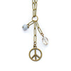 Necklace with peace symbol pendant and gemstone beads on a white background