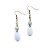 Pair of earrings with white blue lace agate beads on a white background